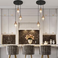 a kitchen with marble counter tops and bar stools