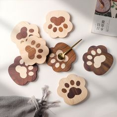 wooden animal paw prints on the back of a clock