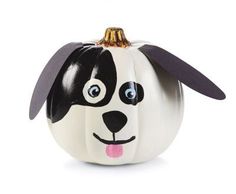 a white and black dog ornament on a white background