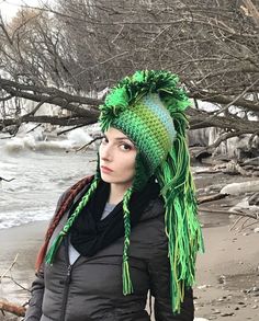 This one of a kind green statement hat would make a great Gift for St. Patricks Day or any day! You or someone you love needs a winter hat! This one is absolutely amazing for any man, woman, child, or teen! I made this very unique Green color gradient called ombre mohawk earflap hat. It has ear flaps and tassels that hang down and a fringe that is long and dramatic Mohawk down the center. It has been crochet with super thick ,sturdy and durable yarn. It is double threaded and super warm. It has Green Mohawk, Hair Gradient, Presents For Girlfriend, Faux Hair, Earflap Hat, Handmade Beanies, Ear Flap Hats, Red Green Christmas, Trapper Hats