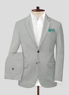 Upgrade your upscale look with the luxe style and comfort of our Light Gray Feather Cotton Canvas Stretch suit. Crafted from cotton lycra blend, the suit is perfect for a man who wants to look his best at any special occasion. Wear it with a matching waistcoat, a crisp white shirt, black tie and polished black dress shoes.  Look Includes   Light Gray Feather Cotton Canvas Stretch Fabric  Two Button Jacket Style  Notch Lapel  Horn Royal Black Buttons  Single Vent  Three Cuff Buttons  Two Welted Back Pockets on Trousers   Click 'Customize Now' to modify the look if needed.  Lining: Viscose; Dry Clean. Luxe Style, Black Dress Shoes, Crisp White Shirt, Button Jacket, Jacket Buttons, Black Button, Jacket Style, Black Tie, White Shirt