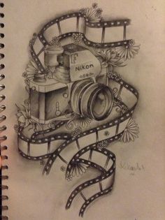 a drawing of a camera and film strip with the words nikn written on it