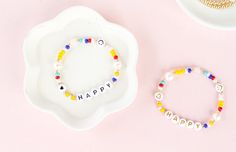 "This listing is for One (1) Personalized Multicolor Beaded Bracelet. This fun bracelet can be personalized with the letters of your choice, numbers, heart beads. Perfect for gifting as it can be personalized with names, words, initials, and many other options. This bracelet is made with a variety of beads as pictured and also as listed below, if you would like any changes please send me a message. Please select Style option as in second picture (Style #1 or #2). Product details: - Stretch Brace Trendy Beaded Bracelets With Letter Print, Multicolor Round Beads Jewelry With Letter Print, Multicolor Letter Print Round Bead Jewelry, Multicolor Letter Print Round Beads Jewelry, Beaded Bracelets With Heart Beads For Birthday, Birthday Stretch Bracelet With Heart Beads, Birthday Charm Bracelet With Letter Beads And Round Beads, Birthday Charm Bracelet With Heart Beads, Birthday Beaded Bracelets With Heart Beads