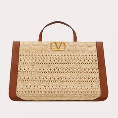 Valentino Garavani Vlogo Signature Handbag With Synthetic Raffia Embroidery. Leather Piping And Vlogo Signature Element On The Front. - Antique Brass-Finish Metal Hardware - Protective Feet - Canvas Lining. Interior: Slip Pocket - Dimensions: W48xh32xd19 Cm / W18.8xh12.5xd7.4 In. - Made In Italy Raffia Embroidery, Hacks Clothes, Fashion Hacks, Fashion Hacks Clothes, Metal Hardware, Brass Finish, Womens Tote Bags, Valentino Garavani, Piping