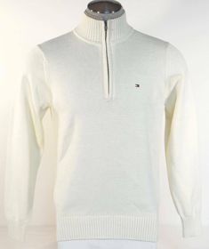 TOMMY HILFIGER 1/2 ZIP COTTON KNIT SWEATER - BRAND: TOMMY HILFIGER - STYLE: 1/2 ZIP SWEATER - STYLE #: 897803762 116 - COLOR: FENCE WHITE (OFF WHITE) - 1/2 Zip Mock Neckline - Double Collar - (1-Off White Knit and 1-Tan Knit) - Ribbed Knit Neckline, Cuffs and Bottom - Small Tommy Hilfiger Logo Embroidered on Upper Left - 100% Cotton Fabric: 100% Cotton MEASUREMENTS FOR VARIOUS SIZES: (approx) SMALL: Center shoulder to bottom: 26 1/2" Armpit to armpit: (measured across front, garment laying flat) White Half-zip Top With Ribbed Collar, White Half-zip Sweater, White Half-zip Sweater With Ribbed Collar, Zip Up Sweaters, Tommy Hilfiger Fashion, Double Collar, Tommy Hilfiger Logo, Sweater Brands, Mock Neckline