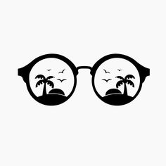 a pair of glasses with palm trees and birds on them