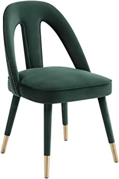 a green chair with gold legs on a white background