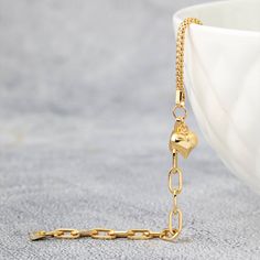 Elegant Gold Plated Chain Bracelet With Heart Charm, Yellow Gold Adjustable Chain Bracelet For Valentine's Day, Valentine's Day Yellow Gold Adjustable Chain Bracelet, Elegant Heart-shaped Bracelet With Chain, Elegant Gold Chain Bracelet For Valentine's Day, Elegant Heart-shaped Formal Chain Bracelet, Elegant Link Jewelry For Valentine's Day, Elegant Rose Gold Chain Bracelet With Heart Charm, Minimalist Yellow Gold Chain Bracelet For Valentine's Day