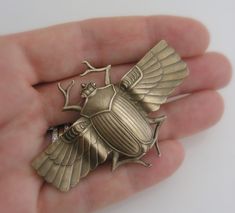 "Vintage Brooch - Art Deco jewelry - Egyptian jewelry - Scarab jewelry - Chloe Vintage Brass jewelry - handmade jewelry This is a fabulous vintage piece! An awesome large Art Deco scarab brooch. Vintage U.S. brass. Remarkable detail with a rich patina. Chloe says, \"Wear it and feel fabulous!\" The brooch measures 2 3/4\" wide Thanks for visiting Chloe's" Costume Jewelry Metal Brooches For Gifts, Metal Costume Jewelry Brooches For Gifts, Handmade Metal Brooches For Gifts, Handmade Metal Brooches As Gifts, Unique Metal Jewelry Brooch, Bronze Brooch Jewelry For Gift, Handmade Brass Brooches For Gifts, Art Deco Pendant Brooches As Gifts, Unique Metal Brooch Gift