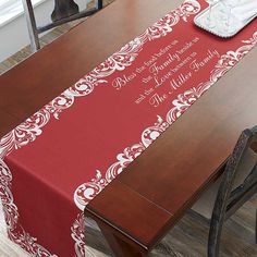 a table with a red and white runner on it