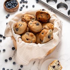 blueberry muffins in a bowl on a table