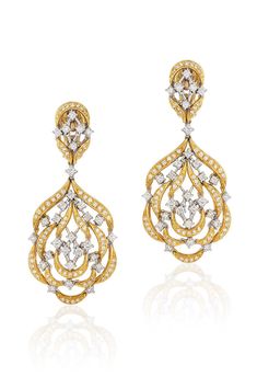 18 karat gold and diamond drop earrings by fine jewelry house Andreoli. 18 karat Gold, 25.3 grams 3.02 carat Diamond Expertly crafted in Italy Andreoli is known for creating bold heirloom steeped in Italian cultural heritage. Their collection of statement wearable art pieces can be worn during celebrations and to elevate your everyday. Estimated Delivery7 working days Customs Duties & Taxes may apply. Shipped from USA Gold And Diamond Earrings, Diamond Chandelier Earrings, Cocktail Earrings, Quince Ideas, Jeweled Earrings, Diamond Dangle Earrings, Precious Jewels, Diamond Drops, Diamond Drop Earrings