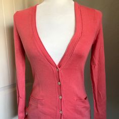 Banana Republic Coral Cardigan. Size Xs Nwt 52% Silk 13% Cotton 35% Polyester Deconstructed Seaming With Ribbed And Pointelle Trim Length From Top Of Shoulder Seam 24” Sleeve Length From Shoulder Seam 23” Bust 28” Stretches To 38” Waist 24” Stretches To 39” Sweep 28” Stretches To 40” Fitted Button-up Cardigan With Pockets, Trendy V-neck Cardigan For Daywear, Fitted V-neck Outerwear For Day Out, Fitted Button-up Sweater With Pockets, Fitted V-neck Cardigan With Pockets, Classic Fitted Sweater With Pockets, Fitted Cardigan With Pockets For Spring, Fitted Long Sleeve Cardigan For Spring, Classic Spring Sweater With Pockets