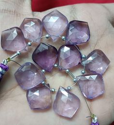 =>Gemstone:- Amethyst.  =>Shape:- Leaf Shape. =>Size:- 16x19 mm. =>Quantity:- 10 Pcs. ----------------------------------------------------------------------------------------------------- ###"WE ARE MANUFACTURERS AND WHOLESALER''### => We assure you that you will like our products. our all items are made by our skilled workers in our factory. We make unique designs and fancy gemstones for our clients at reasonable prices. =>We take the pictures under professional studio lights and enlarge the it Purple Amethyst Gemstone Beads, Amethyst Briolette Multi-stone Gemstones, Elegant Purple Faceted Beads Gemstones, Purple Multi-stone Dangle Jewelry, Luxury Multi-stone Amethyst Gemstones, Studio Lighting, Leaf Shapes, Amethyst Gemstone, Semi Precious Gemstones