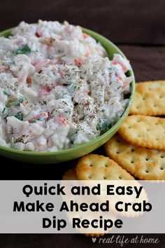 a green bowl filled with crab dip surrounded by crackers on a wooden table and text overlay that reads quick and easy make ahead crab dip recipe