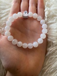 A white glass bead ghost bracelet. Bead Ghost, Ghost Bracelet, Spooky Ghost, Glass Bead, White Glass, United Kingdom, Glass Beads, Ghost, Jewelry Bracelets