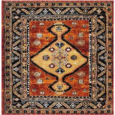 an orange and black rug with ornate designs on the bottom, in front of a white background