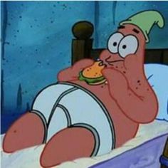 a cartoon character laying in bed with a hamburger in his mouth and wearing a hat