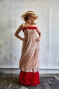 This stunning Winter 2008 Valentino pink/red floor length crepe silk gown has us swooning. Accordion pleated layers - too many to count - adorn the front, while the back is a flattering straight silhouette sans pleats. Bodice is lined with a soft cage construction that gently hugs the torso to stay in place with the help of a few tiny eyelet hooks. Soft red rose petals grace the chest. Truly a must-see work of art. New garment with tags still attached and no damage nor wear present. Tags include Pre-draped Maxi Dress With Folds, Pleated Pre-draped Evening Maxi Dress, Floor-length Silk Dress With Folds, Silk Floor-length Dress With Folds, Maxi Length Evening Dress With Folds, Gala Maxi Dress With Folds, Pleated Pre-draped Floor-length Maxi Dress, Pre-draped Silk Crepe Maxi Dress, Red Pre-draped Dress With Pleated Bodice