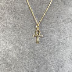 925 Sterlin Silver Ankh symbol represents the Eternal Life way back in Ancient Egypt also sometimes referred to as the Key of Life. Item Details ★ 10 - 14 - 18 K Real Gold ★ Necklace Diameter: 2.00cm x 1.20cm (0.79inc x 0.47inc) Welcome to our store, where you'll find designs perfect for both special occasions and everyday wear. Our collection is designed to help you stand out with unique, cool styles. Whether you're looking for something spiritual, religious, nature-inspired, nautical, or influ Symbolic Jewelry With Adjustable Chain, Symbolic Yellow Gold Adjustable Necklace, Adjustable Yellow Gold Symbolic Necklace, Adjustable Yellow Gold Symbolic Necklaces, Silver Ankh Necklace In Brass, Nickel Free Ankh Jewelry Gift, Nickel-free Ankh Elegant Jewelry, Nickel-free Ankh Shaped Elegant Jewelry, Elegant Nickel-free Ankh Jewelry