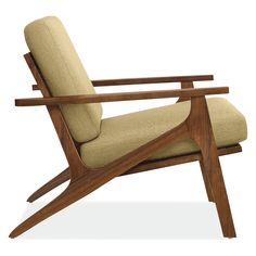 a wooden chair with beige upholstered fabric on the back and armrests