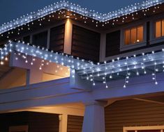 a house with christmas lights on the roof