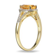 Make a stylish statement with this stunning yellow-gold citrine and lab-created white sapphire fashion ring. Sterling silver with 18K gold plate. The ring showcases a 9.0 x 6.0mm pear-shaped golden-yellow citrine center stone. White lab-created sapphires border the citrine and line the ring's split shank. Luxury Citrine Diamond Ring In Yellow Gold, Luxury Yellow Gold Citrine Diamond Ring, Luxury Yellow Sapphire Rings With Diamond Accents, Yellow Gold Citrine Diamond Ring With Accents, Yellow Gold Diamond Ring With Citrine Accents, Luxury Yellow Gold Topaz Ring With Diamond Accents, Elegant Yellow Oval Sapphire Ring, Citrine Diamond Ring With Accent Stones In Yellow Gold, Luxury Yellow Topaz Ring With Diamond Accents