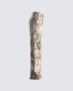 the realtree camo boot cover is shown on a gray background with no shoes