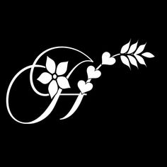 a black and white photo of flowers on a branch with hearts in the center, against a dark background