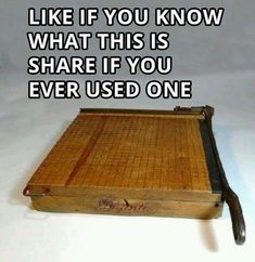 a wooden box with a knife on top of it that says, like if you know what this is share if you ever used one