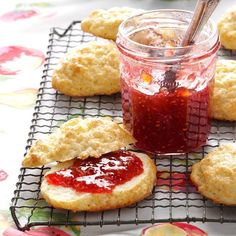 some cookies and jam on a cooling rack