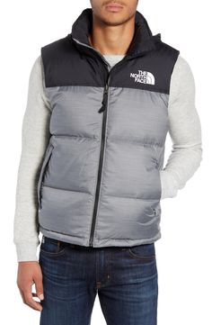 A retro North Face vest based on a baffle-quilted, down-insulated design from 1996 offers unmatched warmth right at the core. The durable ripstop shell with double-layer taffeta at the shoulders is perfect for backpacking, thanks to its packable design that can be stowed in its own pocket. Style Name:The North Face Nuptse 1996 Packable Quilted Down Vest. Style Number: 5698420. The North Face Down Puffer Jacket For Outdoor, Quilted Nylon Puffer Jacket For Hiking, Nylon Puffer Outerwear For Camping, Sporty Nylon Puffer Jacket For Hiking, Functional Nylon Puffer Jacket By The North Face, Winter Nylon Vest For Outdoor, Winter Outdoor Nylon Vest, Outdoor Puffer Vest, Winter Outdoor Down Vest