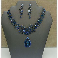 New Unused Cubic Zirconia And Australian Crystal Necklace Set. Matching Earrings Have Post Backings And Are Lightweight. This Necklace Is A Beautiful Breathtaking Piece To Enjoy For Years To Come. This Set Is Unique Because It's Rare To Find A Navy Blue Crystal And Cubic Zirconia Combination. Blue Round Necklaces For Evening, Sapphire Cubic Zirconia Jewelry For Evening, Formal Crystal Jewelry Sets With Jeweled Details, Blue Crystal Jewelry Sets For Wedding, Formal Jeweled Crystal Jewelry Sets, Formal Crystal Jeweled Jewelry Sets, Blue Cubic Zirconia Teardrop Jewelry Sets, Blue Teardrop Cubic Zirconia Jewelry Sets, Elegant Jeweled Sapphire Jewelry