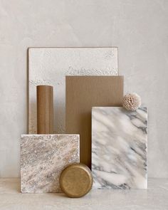 marble and wood are stacked on top of each other