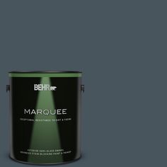 the behr marquee paint is dark brown and has a green tint