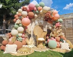 an outdoor area with balloons and decorations