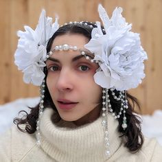 Now offering pickup in the Chicago area! Use code LESPRITEPICK (to cancel out the shipping cost) then message me to coordinate a pick up time.  .... "Snow Flower Fairy" headpiece, dripping in pearls 🤍❄️  This was inspired by sparkly white winter landscapes, with flowers to remind that beneath the snow lies new life waiting to bloom 🌼  Sparkly white leaves flare out under delicate white flowers, with draped chain and dangling bead accents.  While this piece was made in winter, it's part of my new bridal line and wearable for any season! One size fits most, please message me for preferred sizing. Snowflake Headpiece, Ice Headpiece, Whimsical White Hat Headpiece, Winter Headpiece Snow Queen, Fairy Headpiece, White Flower-shaped Hair Accessories With Handmade Flowers, Snow Flower, Pearl Headpiece, Vintage Nightgown