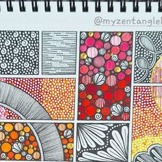 an art journal with different colored designs on it