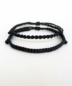 "Black macrame bracelets flat or spiral braided Classic macrame friendship bracelets perfect for everyday wear! These handknotted bracelets are made with durable black waxed string. They are adjustable and have a sliding knot closure in order to fit a lot of sizes. Due to their waxed threads,the bracelets are very durable and water resistant. Width: 4cm / 0.15\" The price is for 1 style of bracelet. Similar bracelets: https://www.etsy.com/listing/227376437/kabbalah-braceletsmacramered?ref=shop_h Shifting Jewelry, Black Friendship Bracelet, Rat Jewellery, Jewelry Everyday, Mens Bangles, Surf Jewelry, Everyday Wear Jewelry, Black Macrame, Beach Bracelet