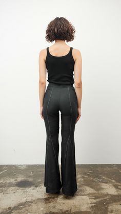 Introducing our Black Zig-Zag Flare Pants: a bold statement in contemporary fashion. These pants feature a distinctive zig-zag pattern that adds an edge to the classic flare style. Crafted for those who dare to stand out, they're perfect for creating memorable looks. Pair them with a sleek top for a balanced ensemble, or go bold with contrasting patterns. Ideal for fashion-forward individuals seeking to make a statement. XS S M L XL Chest/sm 84 88 92 96 100 Waist/sm 64 68 72 76 80 Hip/sm 92 96 1 Fitted Wide Leg Bottoms With Contrast Stitching, Fitted Wide-leg Pants With Contrast Stitching, Fitted Black Linen Bottoms, Zig Zag Pattern, Zig Zag, Contemporary Fashion, Flare Pants, Sleek, Fashion Forward