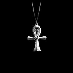 This solid gold key of Ankh necklace showcases exquisite craftsmanship, symbolizing life and spirituality. The key of Ankh pendant is more than just jewelry; it's a fine representation of ancient Egyptian elegance and the timeless allure of this sacred symbol. PENDANT INFORMATIONThis pendant is made of real, solid gold.• Made in USA• Material: 14k or 18k solid gold• Finish: polished• Height: 1.42" (36 mm) x Width: 0.97" (24,5 mm)• Pendant weight: approx. 6 grams (14k)• Bail: fits up to 4 mm chai Symbolic Large Cross Pendant Jewelry, Symbolic White Gold Cross Necklace, Silver Ankh Necklace For Ceremonial Use, Silver Ankh Necklace For Ceremonial Occasions, Ceremonial Cross Necklace In Spiritual Style, Elegant Ceremonial Cross Necklace, Sterling Silver Amulet Necklace With Cross Pendant, Ceremonial Ankh Amulet Necklace, Spiritual Ankh Necklace For Ceremonial Use