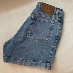 Tag Size: 11/12 High Waisted Denim Vintage Calvin Klein Shorts With Button Closure. Great Condition. No Tags, But Never Worn. Calvin Klein Relaxed Fit Straight Leg Bottoms, Casual Mid-rise Jeans By Calvin Klein, Casual Mid-rise Calvin Klein Jeans, Casual Calvin Klein Mid-rise Jeans, Calvin Klein Casual Mid-rise Jeans, Calvin Klein Fitted Casual Shorts, Trendy Calvin Klein Summer Bottoms, Casual Blue Calvin Klein Bottoms, Trendy Fitted Calvin Klein Bottoms