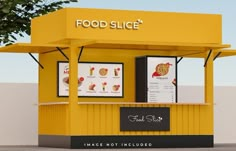 a yellow food stand sitting next to a tree