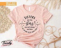 "Sisters Are Like Stars Shirt, Sisters Gift, Big Sister Shirt, Little Sister Shirt, Siblings Shirts Gifts, Matching Sister Shirts, Auntie Shirt ----- How To Order ----- 1-) Please, check and review all the photos. 2-) Choose your t-shirt size and color. *Different styles of shirts may have different shades of same color choice due to different manufacturer brands. *For this reason, we recommend you to match shirts from the same styles if you want precisely matching colors (ex. Unisex, V-necks, T Sister Shirts For 3, Sister Shirt Ideas, Sister Tshirt Ideas, Sister Tee Shirts, Sister Tshirts Ideas For Adults, Sister Shirts For Adults, Sisters Shirts For Adults, Sisters Tee Shirts, Big Sister Little Sister Shirts Vinyl