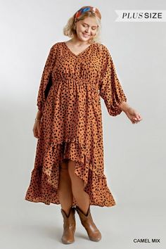 Umgee This Dalmation print hi lo midi dress features a ruffle hem and a loose, flowy design. Ruffle hem, unlined, V neck, elastic waist. This is certainly an eye-catching look! Color: Camel Sizes: XL 1X 2X 100% Polyester G3/WA5862 Casual Fall Dress With High-low Hem, Casual Brown Dress With Asymmetrical Hem, Flowy Midi Dress With Ruffle Asymmetrical Hem, Flowy Midi Dress With Asymmetrical Ruffle Hem, Casual Midi Dress With Asymmetrical Ruffle Hem, Bohemian Style Flowy Midi Dress With Asymmetrical Hem, Beach Midi Dress With Ruffle Hem For Fall, Fall Vacation Maxi Dress With Ruffle Hem, Fall Maxi Dress With Ruffle Hem For Beach