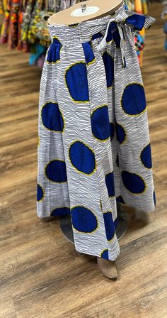 African skirt for women. It has a ribbed elastic waist band with ties on the side to help make a comfortable fit for multiple sizes. The full length skirt has deep pockets. This skirt is 37 inches long and will never go out of style. Don't delay order yours today. Long African Skirt, Blue African Print, Skirt African Print, African Skirt, Broomstick Skirt, Skirt A Line, African Print Skirt, African Skirts, Full Length Skirts