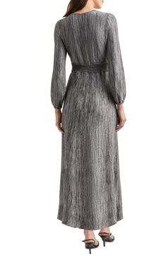 This eye-catching sweater-dress boasts a stunning yarn-dyed pattern and a flowy silhouette that goes anywhere with ease. Surplice V-neck Long sleeves with elastic cuffs 100% polyester Hand wash, dry flat Imported Fall Evening Viscose Maxi Dress, Chic Silver Maxi Dress, Silver Long Sleeve Winter Dress, Silver Long Sleeve Dress For Winter, Elegant Winter Midi Dress In Viscose, Metallic Evening Dresses For Fall, Elegant Silver Dresses For Fall, Chic Silver Winter Dress, Elegant Silver Long Sleeve Maxi Dress