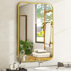 a bathroom with a sink, mirror and towel rack