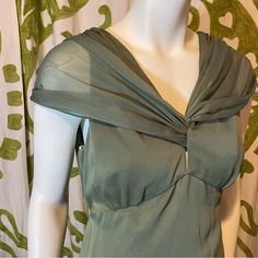 Lovely Sage-Green Vera Wang Designer Gown. Sleeveless, Neoclassical Silhouette With Two Attached Chiffon Sashes That Can Be Tied In Multiple Ways. Your Styling Options Are As Endless As Your Creativity With This Versatile Gown Suited For All Seasons. (Tags Are Attached With A Safety Pin But Appears Unworn). Fitted Silk Chiffon V-neck Maxi Dress, Sheer Sleeveless Flowy Chiffon Dress, Pre-draped Sheer Sleeveless Dresses, Sleeveless Silk Chiffon Maxi Dress For Cocktail, Pre-draped Sleeveless Bias Cut Maxi Dress, Sleeveless Maxi Dress With Fitted Bodice And Sheer Details, Fitted Bodice Sleeveless Sheer Maxi Dress, Green Silk Maxi Dress With Pleated Bodice, Elegant Green Sheer Maxi Dress