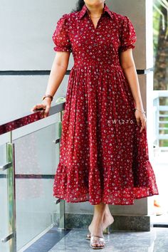 930+£ Women's Midi dress in printed Georgette material. Has collar neck with show buttons, short puff sleeves. Lining and back knot attached.Flared hem. Size- S M L XL Length -46 inches Siaj2 message for 8309952807 if anyone want to buy or start reselling also Long Frocks With Collar Neck, Nee Length Frock, Collar Neck Gown Designs, Womens Frocks Dresses, Collar Neck Long Frock Designs, Frock Models Short, Collar Frock Designs, New Western Dress Designs, Collar Neck Frock